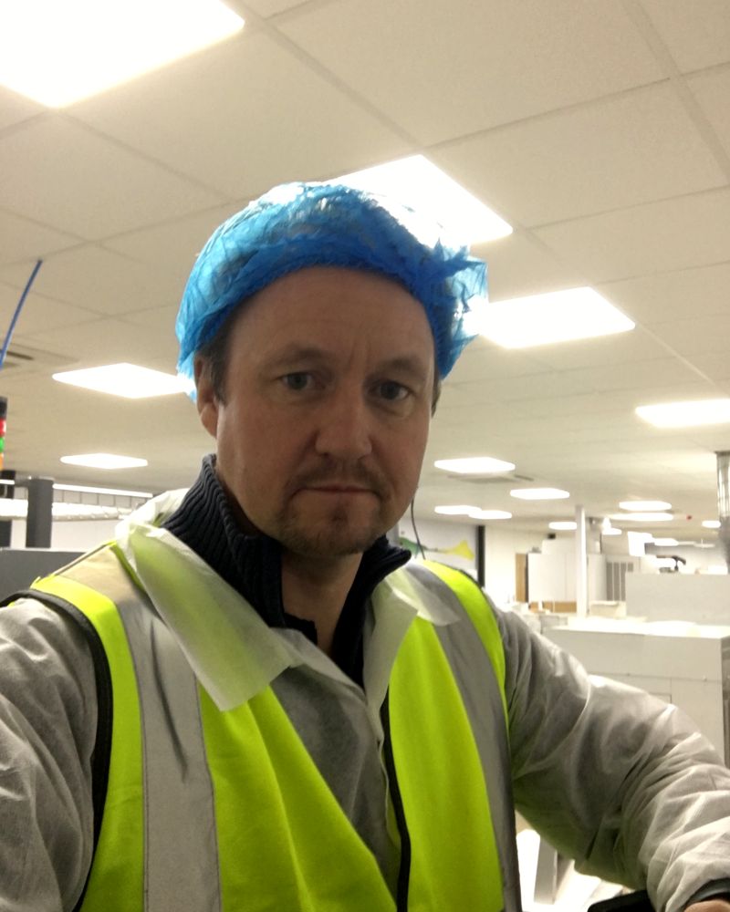 Mads Kylling in protective clothing in a production environment